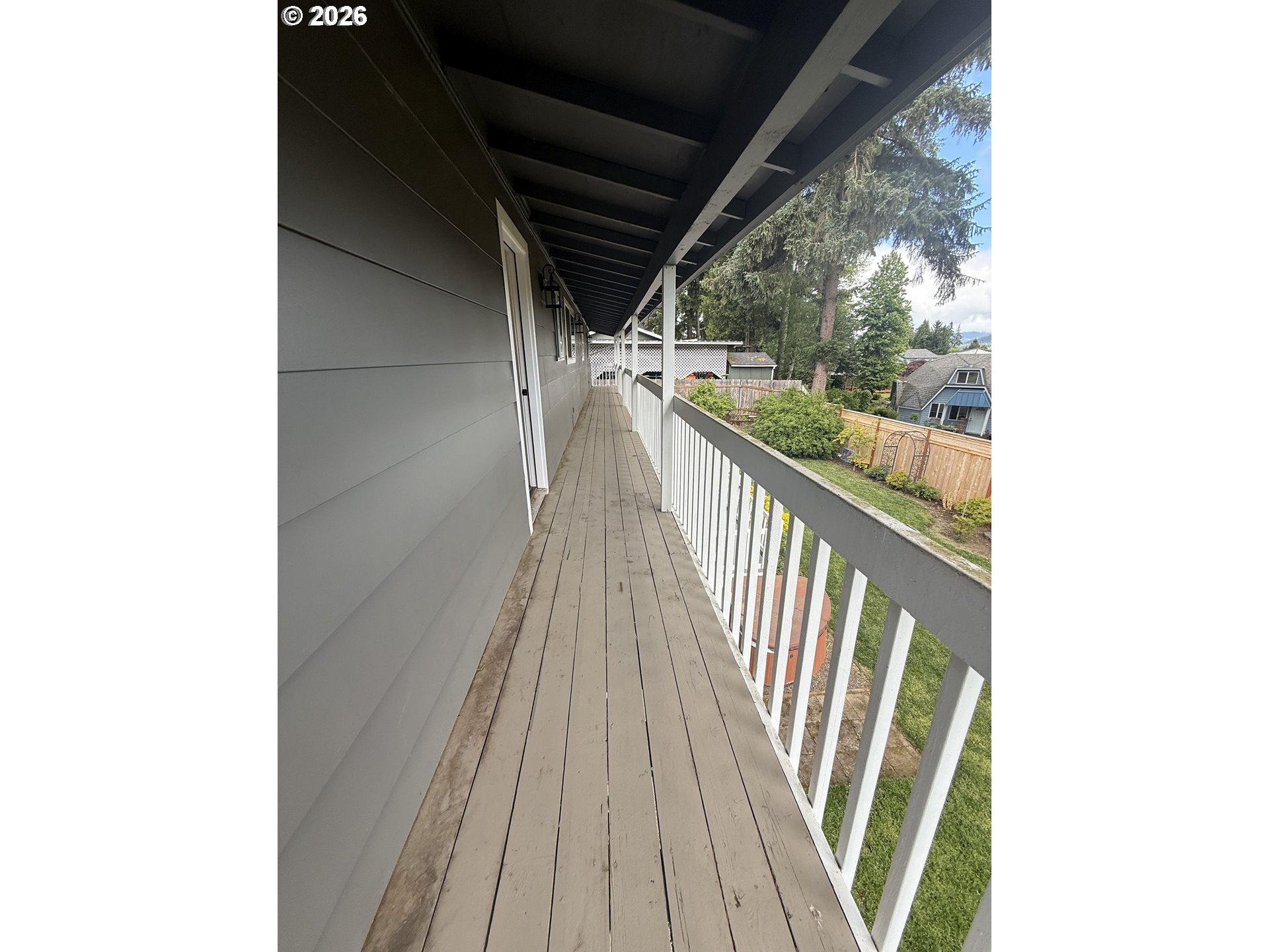 6974 Glacier Drive Springfield, OR 97478 - Photo 26 of 37 a view of balcony with wooden floor
