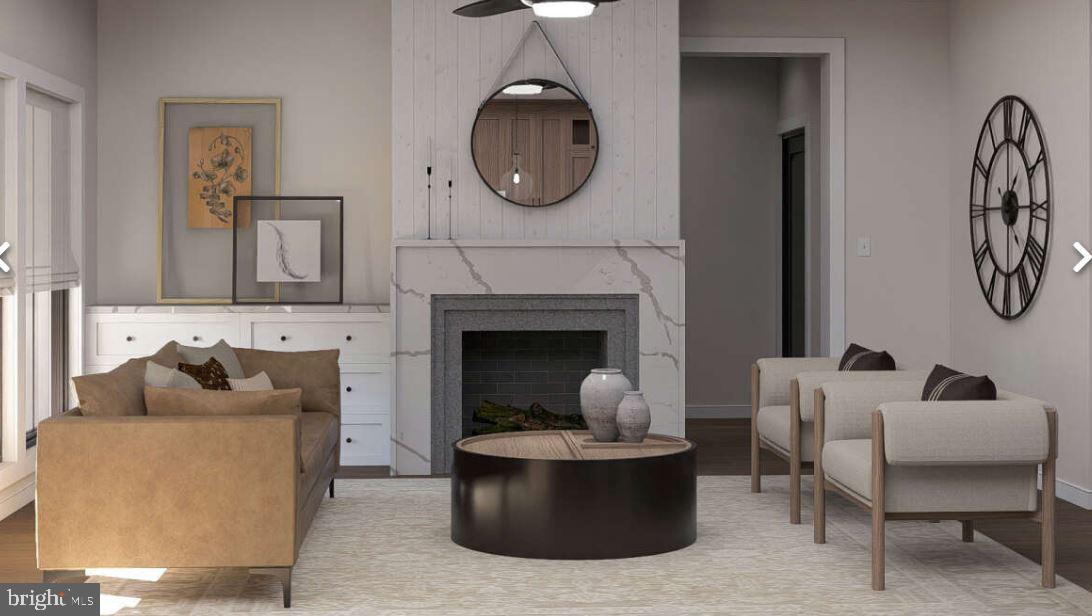 Lutz Road Stewartstown, PA 17363 - Photo 4 of 10 a living room with furniture and a fireplace