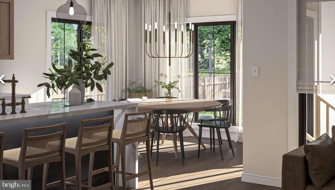 Lutz Road Stewartstown, PA 17363 - Photo 7 of 10 a dining room with furniture window and wooden floor