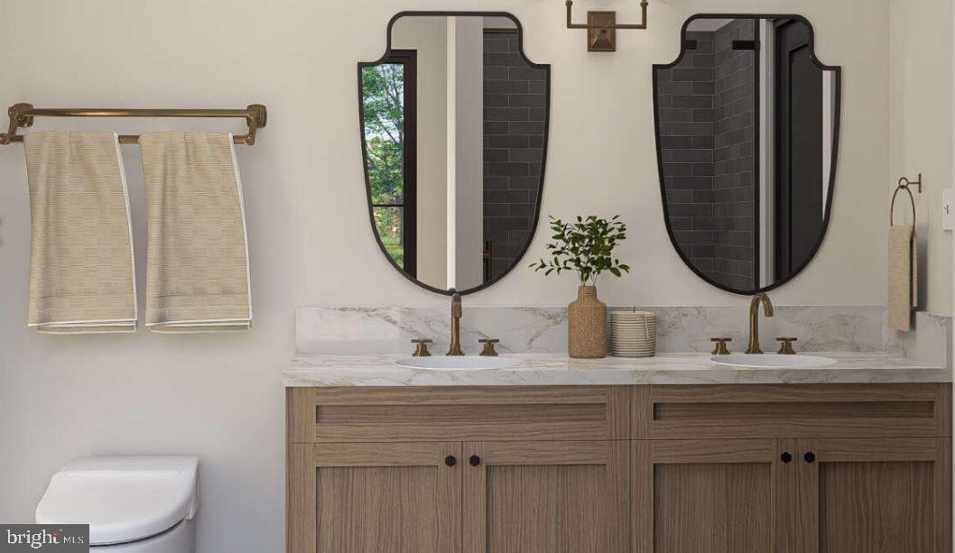 Lutz Road Stewartstown, PA 17363 - Photo 9 of 10 a bathroom with double vanity sinks and a mirror