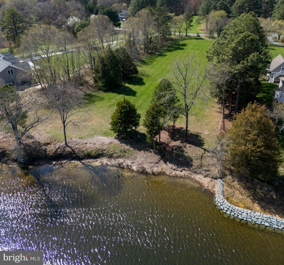 0 Sailors Retreat Road Oxford, MD 21654 - Photo 11 of 13 a view of a lake with beach and outdoor space