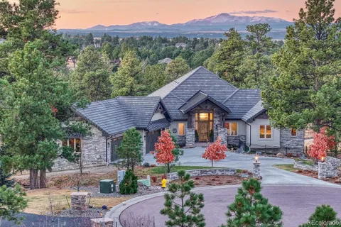 an outdoor space with lots of trees