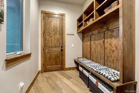 a view of room with stairs and furniture