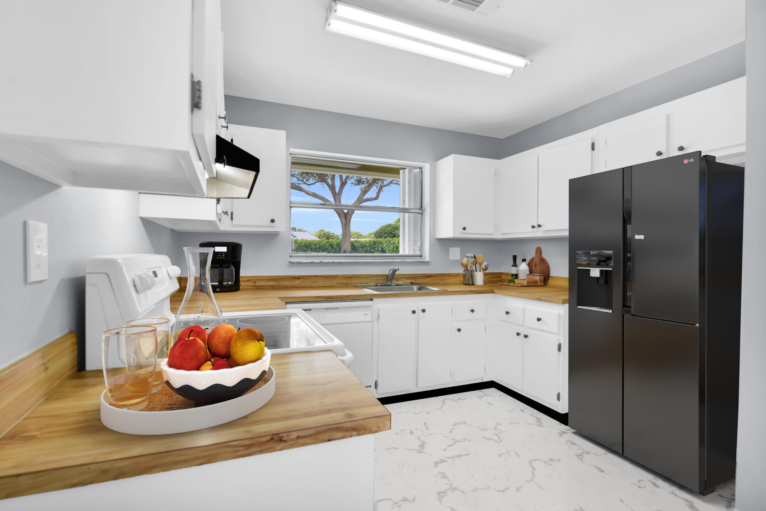 6371 Boca Circle Boca Raton, FL 33433 - Photo 28 of 54 Virtually Staged Kitchen w/Fridge