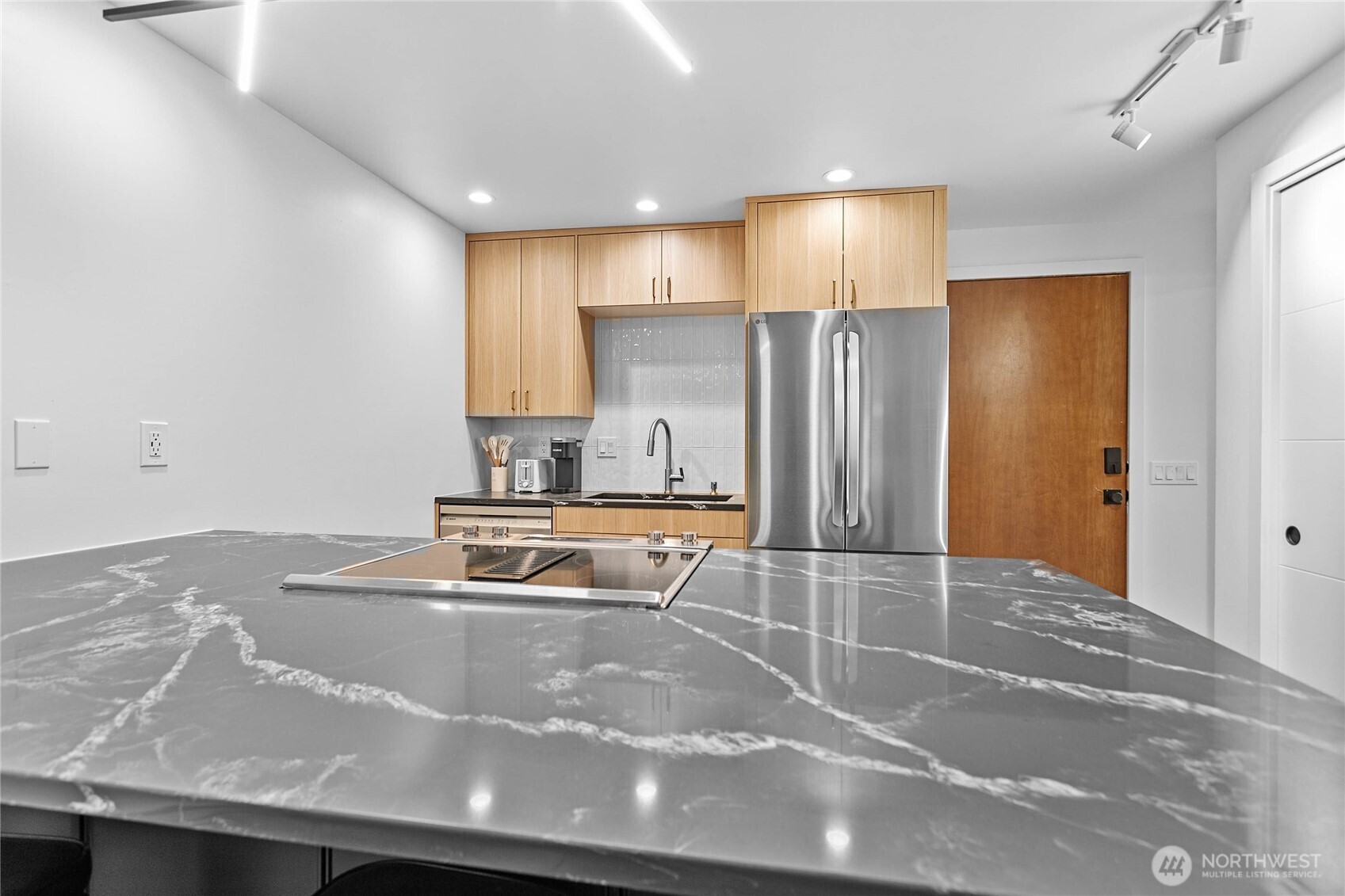 2 Marigold Drive, Unit 36 Bellingham, WA 98229 - Photo 3 of 39 a room with wooden floor and large window