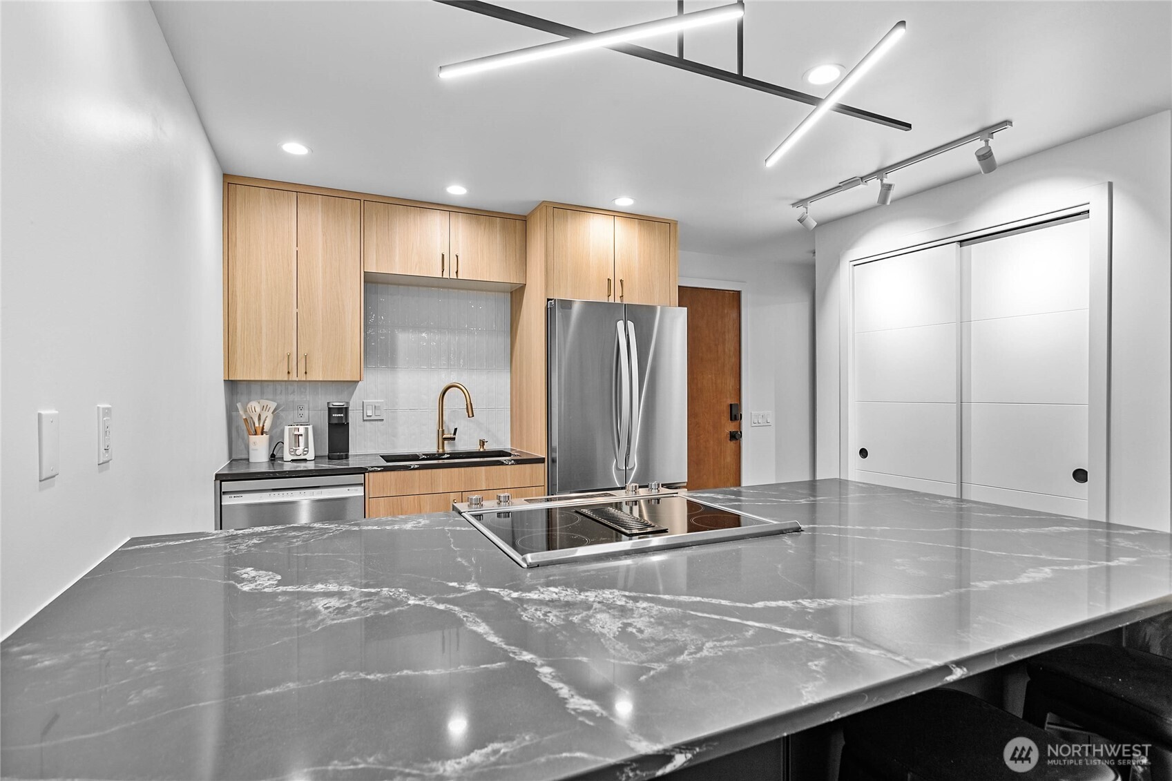2 Marigold Drive, Unit 36 Bellingham, WA 98229 - Photo 4 of 39 a view of a kitchen with a sink and cabinets