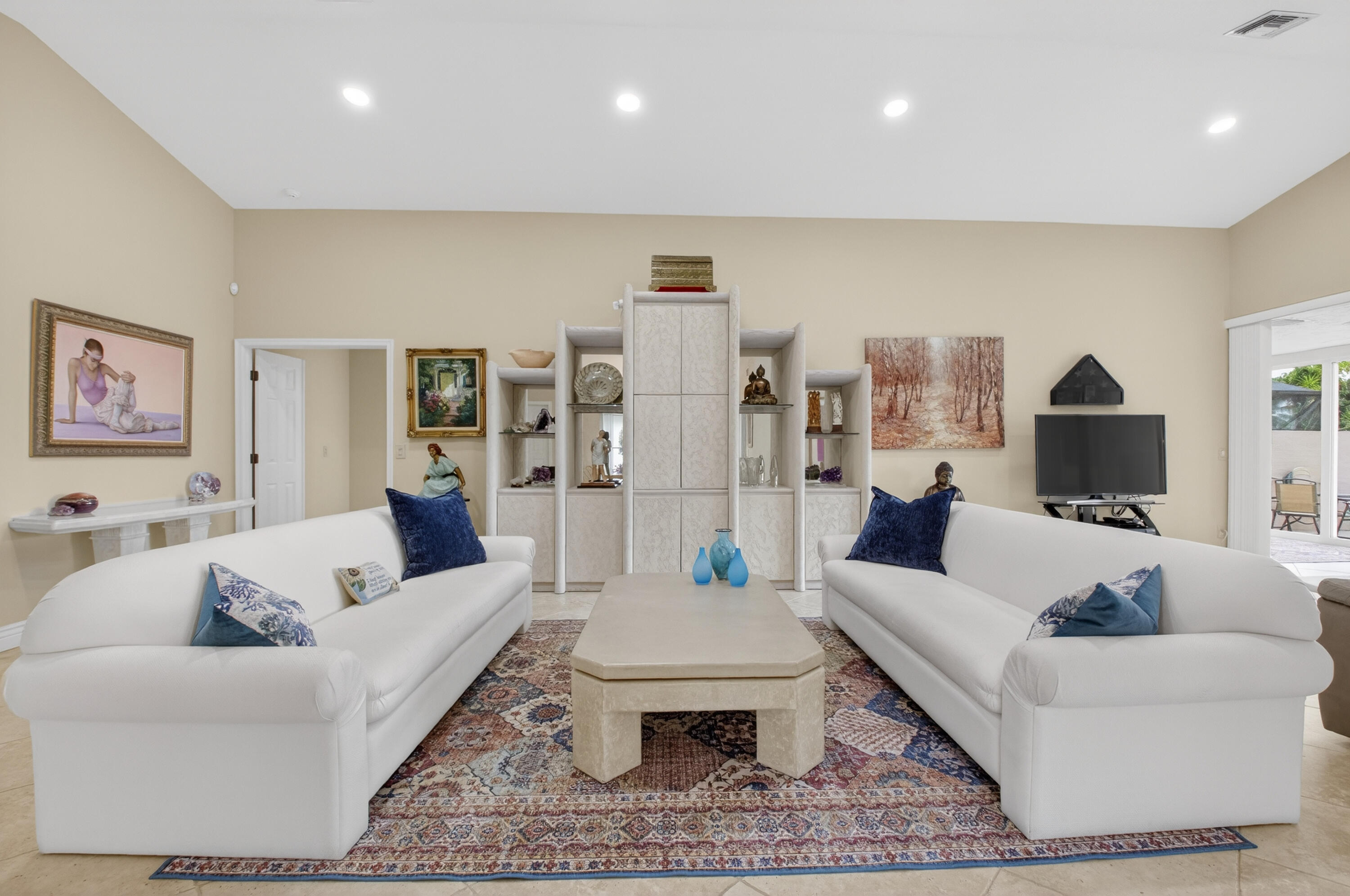 11253 Cloverleaf Circle Boca Raton, FL 33428 - Photo 11 of 79 a living room with furniture and a rug