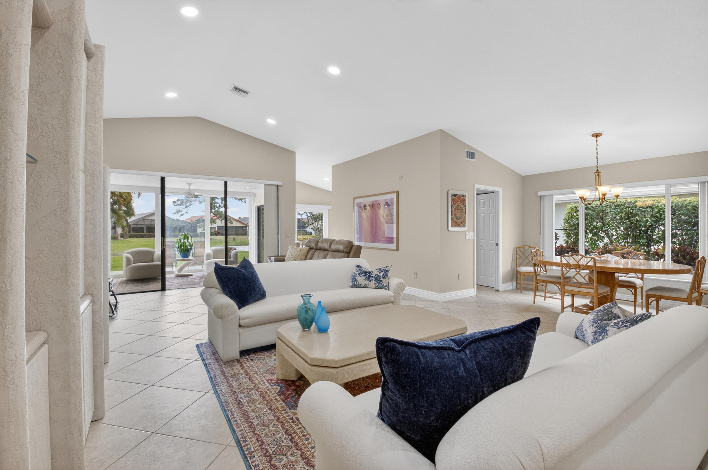 11253 Cloverleaf Circle Boca Raton, FL 33428 - Photo 13 of 79 a living room with furniture and a large window