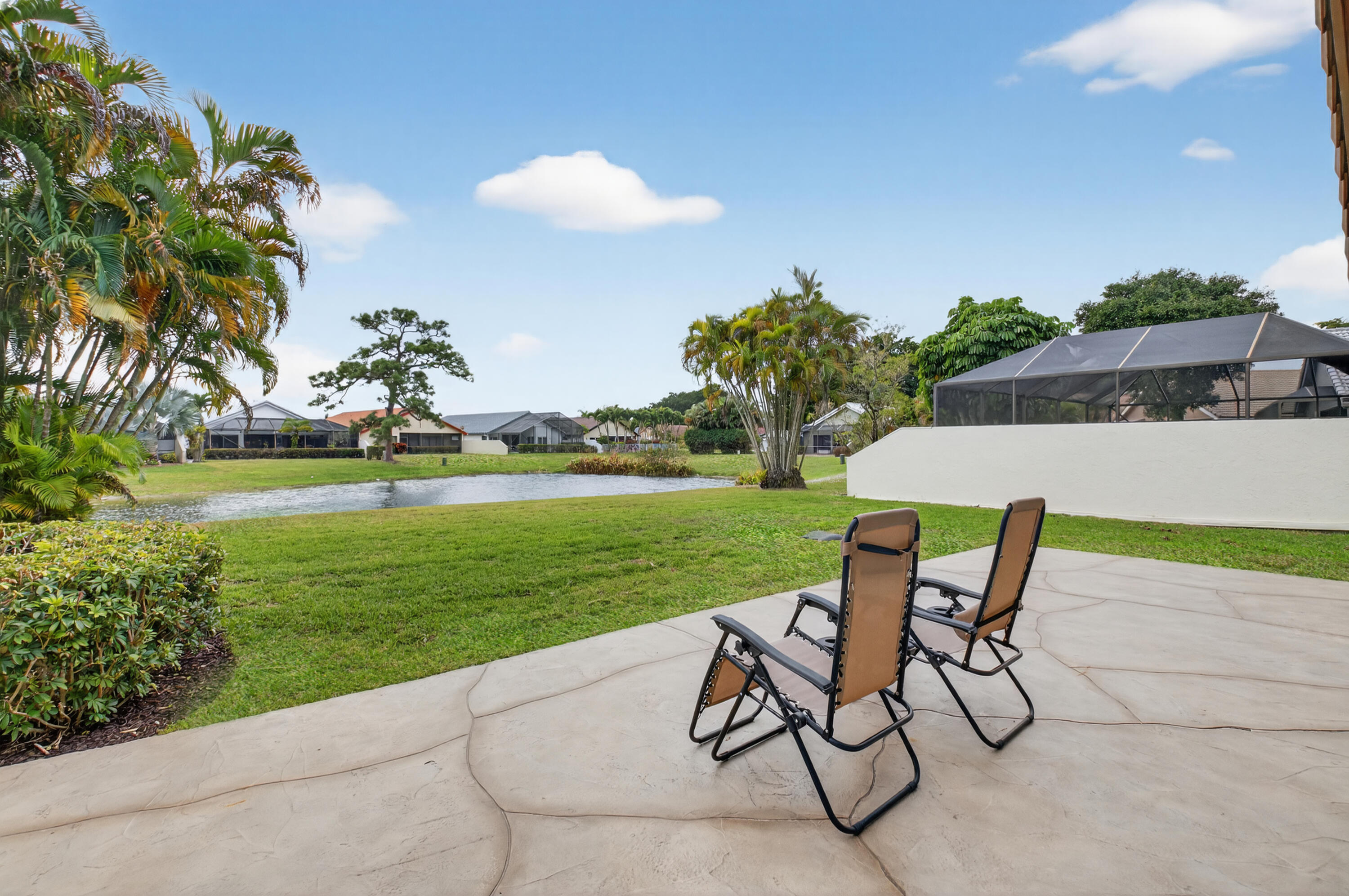 11253 Cloverleaf Circle Boca Raton, FL 33428 - Photo 42 of 79 a view of yard with swimming pool and green space
