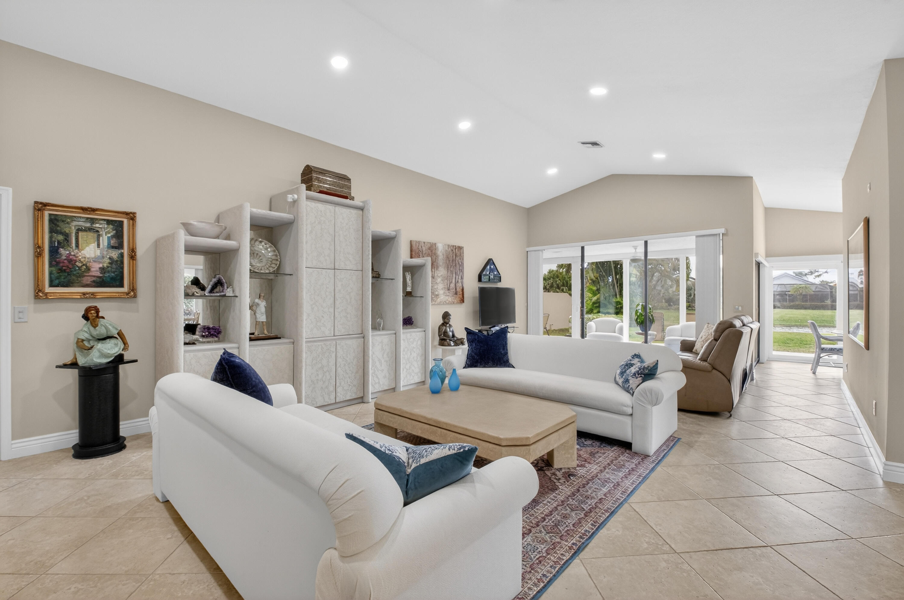 11253 Cloverleaf Circle Boca Raton, FL 33428 - Photo 7 of 79 a living room with furniture and a rug