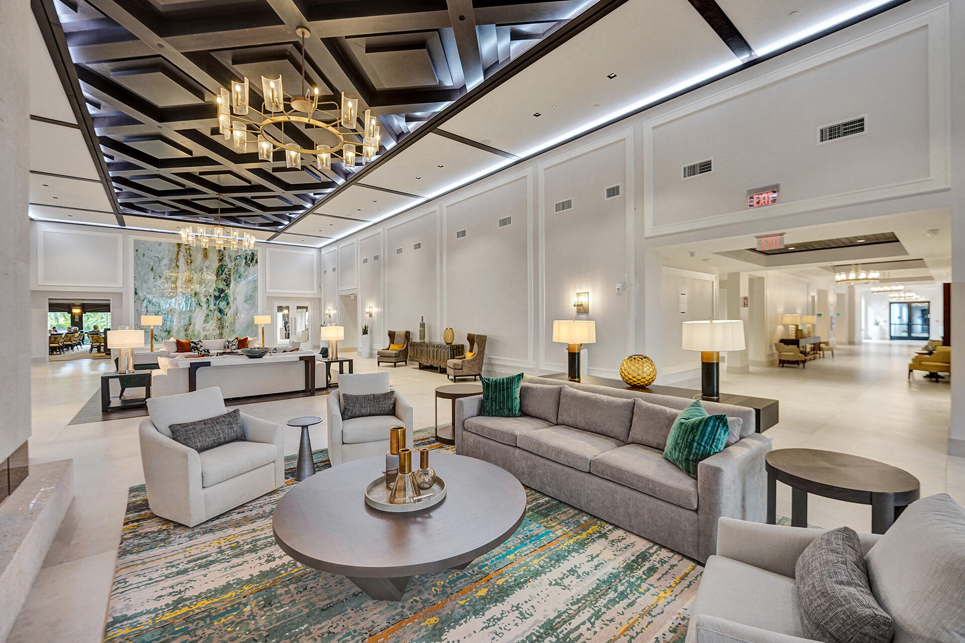 11253 Cloverleaf Circle Boca Raton, FL 33428 - Photo 79 of 79 a living room with furniture kitchen view and a chandelier