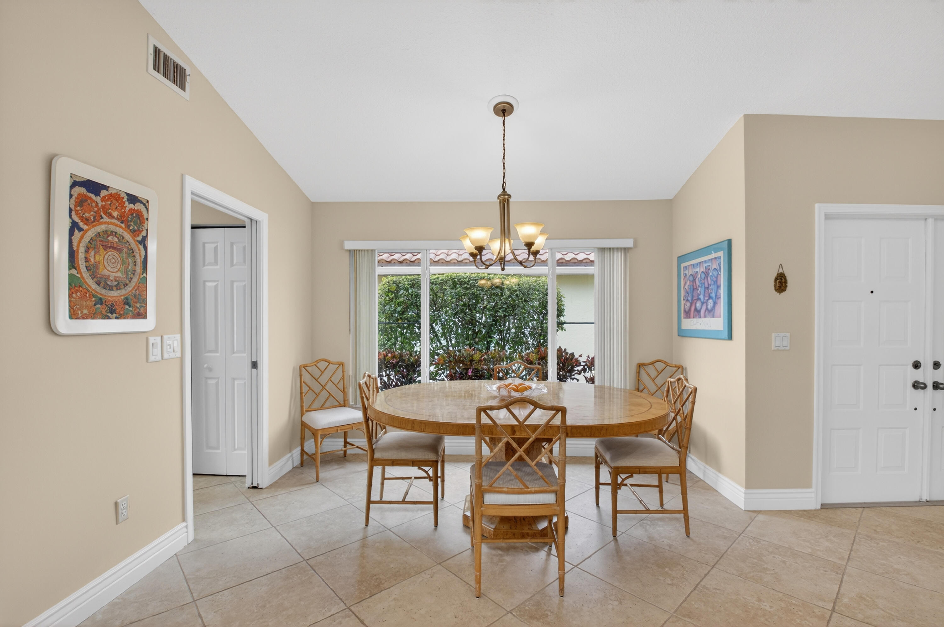 11253 Cloverleaf Circle Boca Raton, FL 33428 - Photo 8 of 79 a view of a dining room with furniture window and outside view