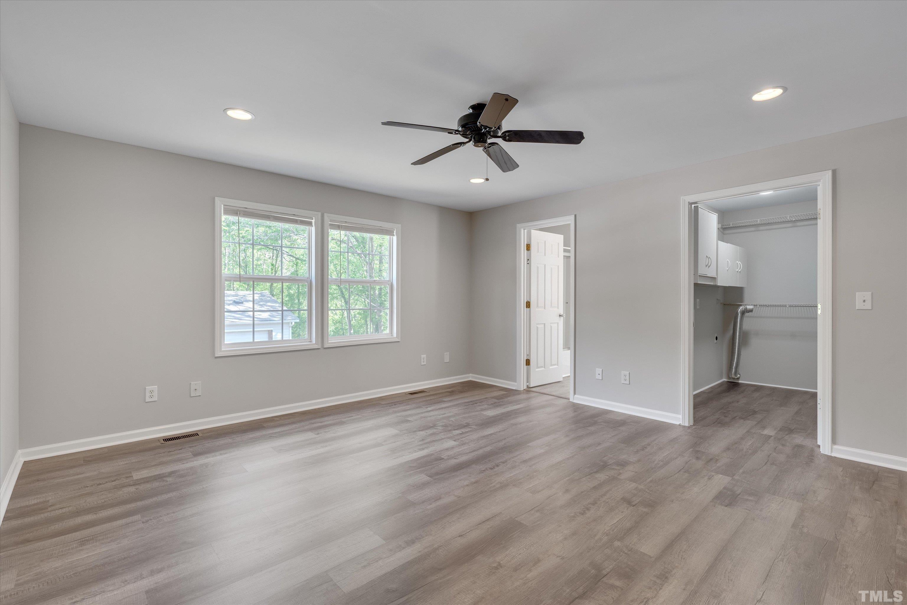 308 South Mineral Springs Road Durham, NC 27703 - Photo 17 of 42 wooden floor in an empty room with a window