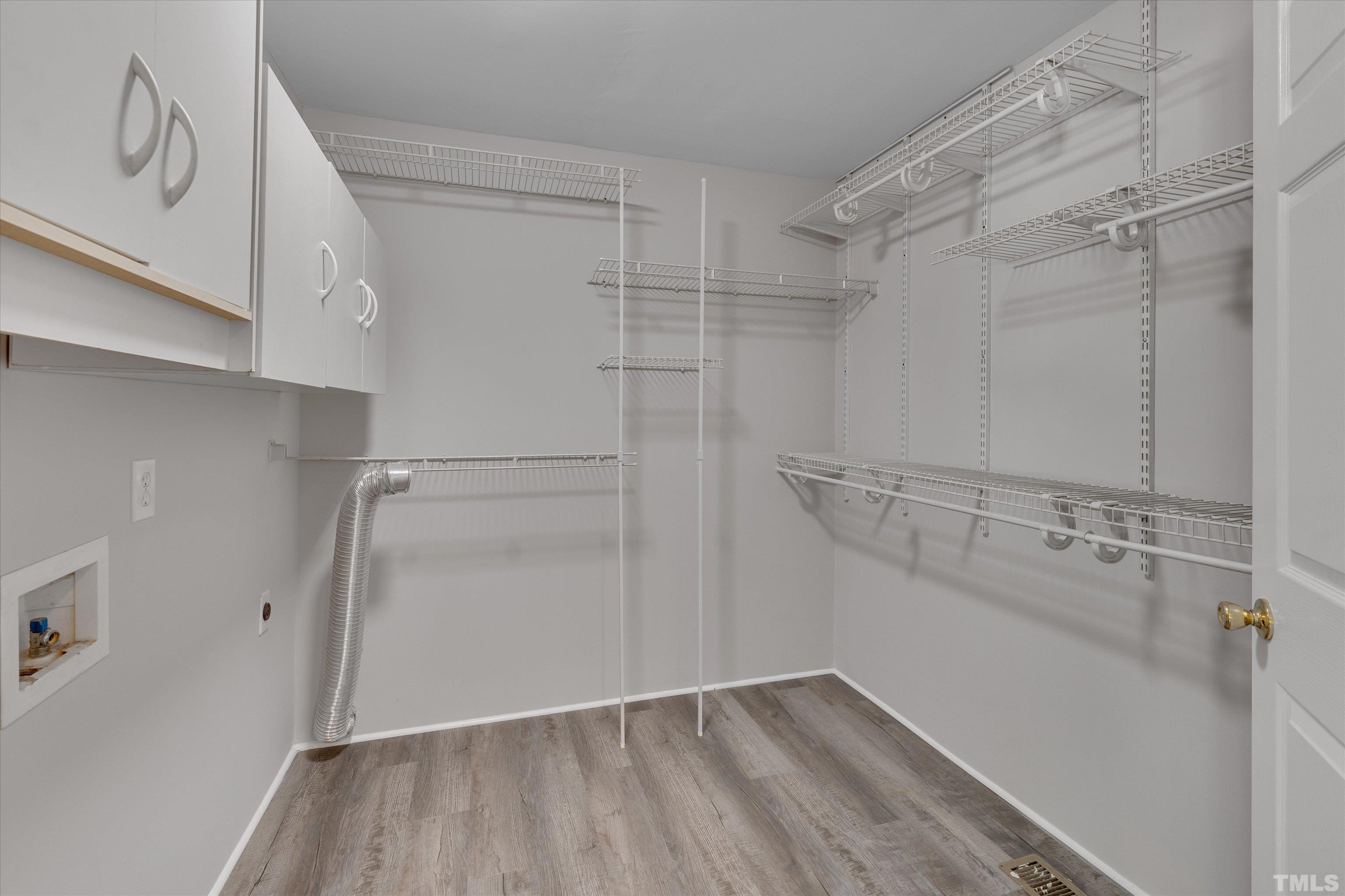 308 South Mineral Springs Road Durham, NC 27703 - Photo 21 of 42 a view of a room with racks on the wall