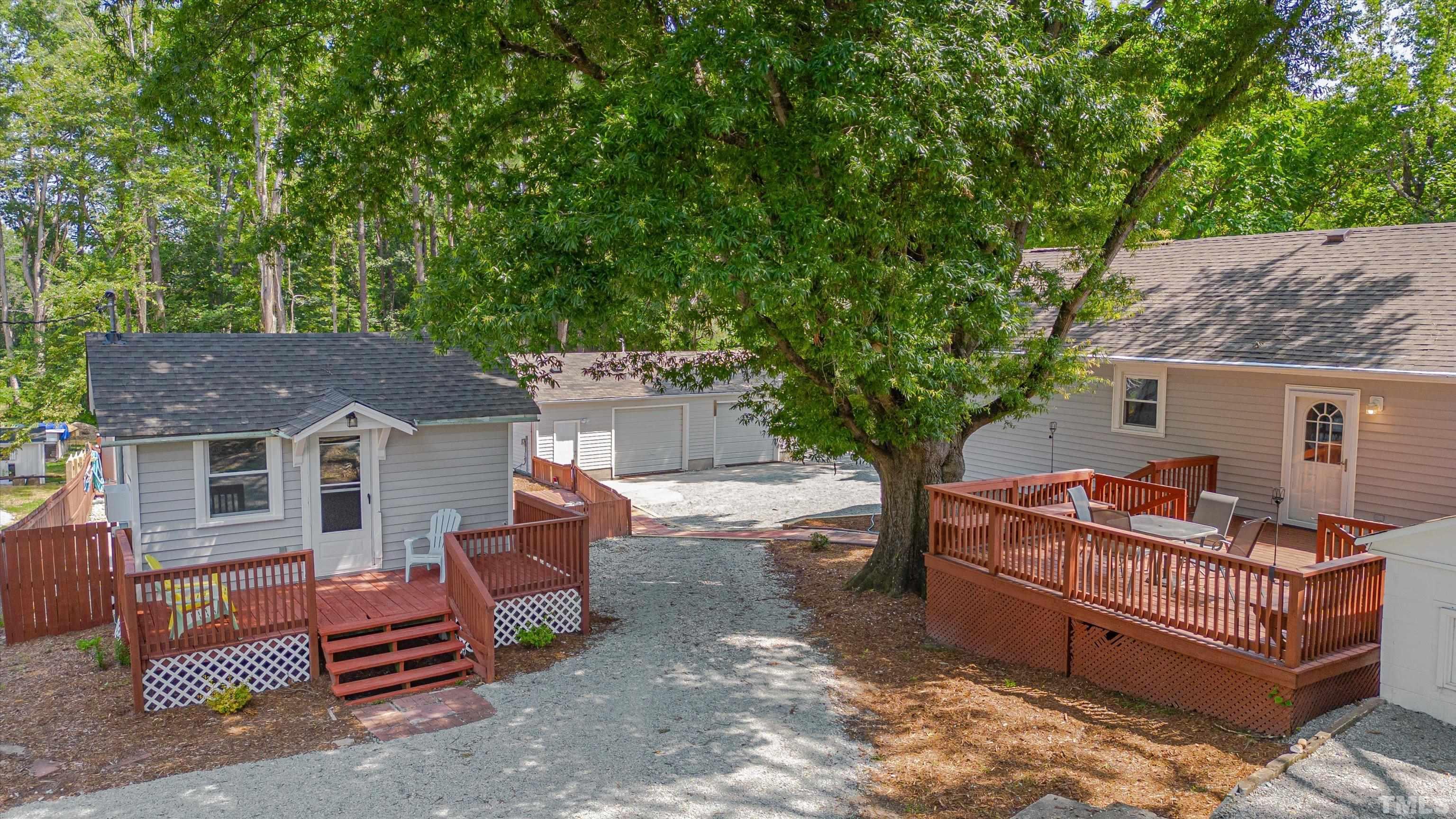 308 South Mineral Springs Road Durham, NC 27703 - Photo 3 of 42 front view of a house with a tree
