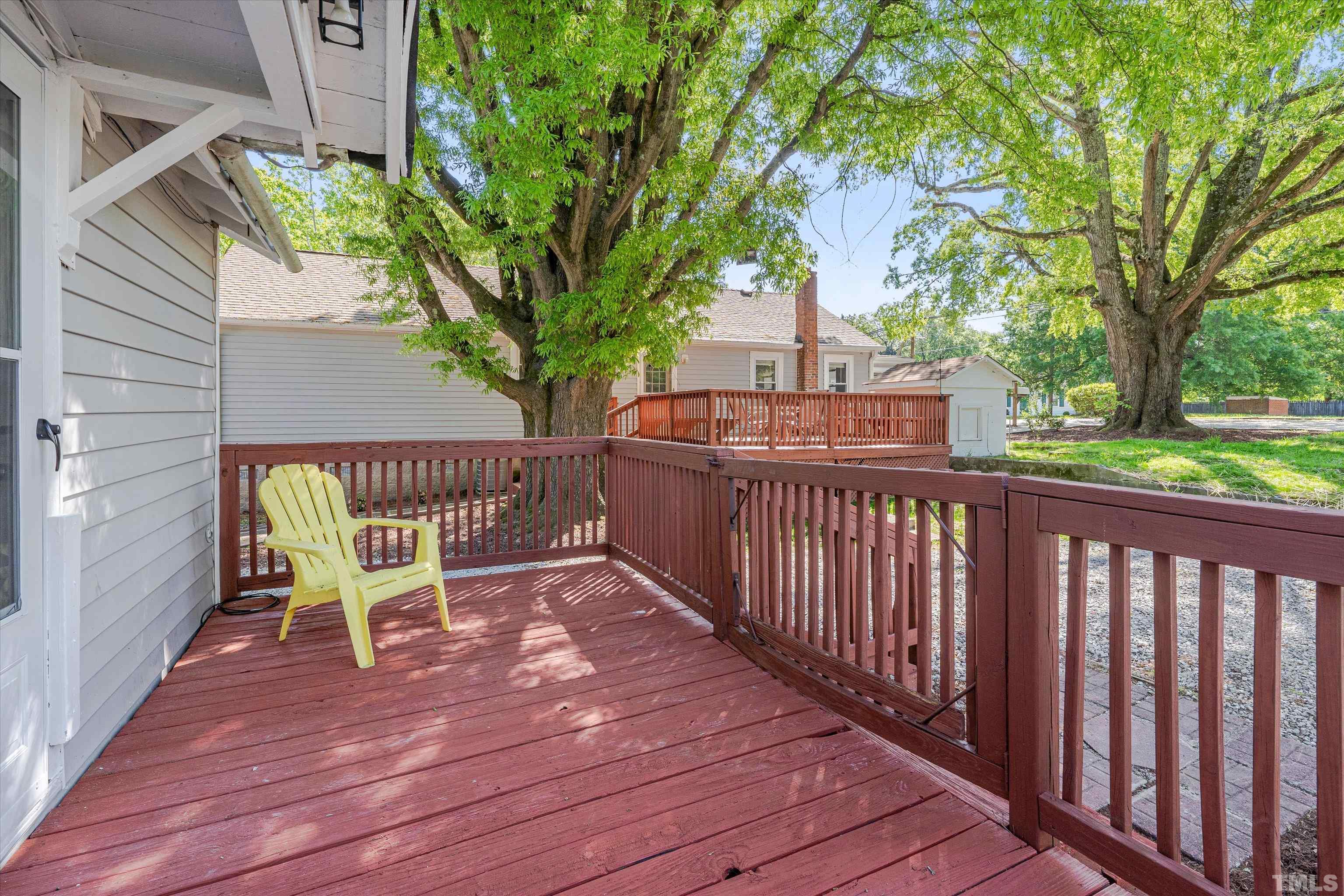 308 South Mineral Springs Road Durham, NC 27703 - Photo 31 of 42 a view of a chairs on a deck
