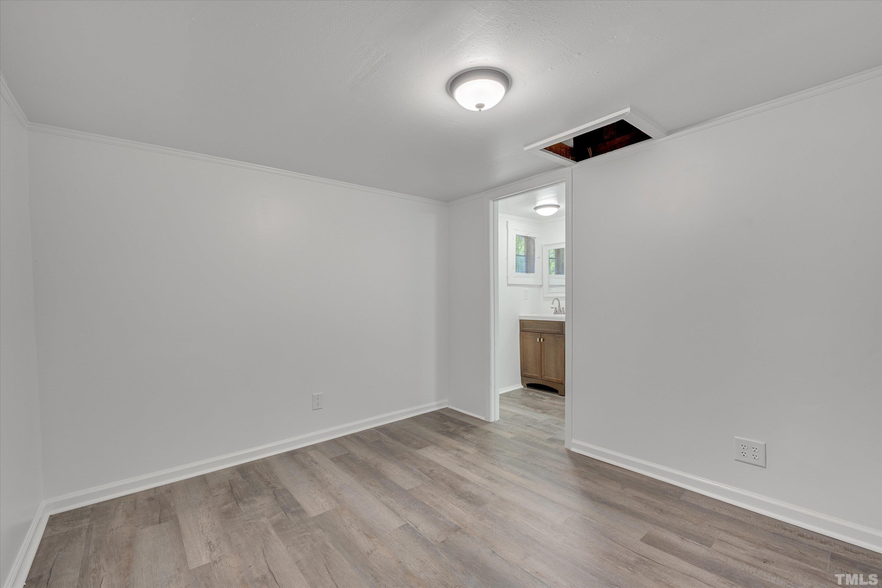 308 South Mineral Springs Road Durham, NC 27703 - Photo 33 of 42 wooden floor in an empty room