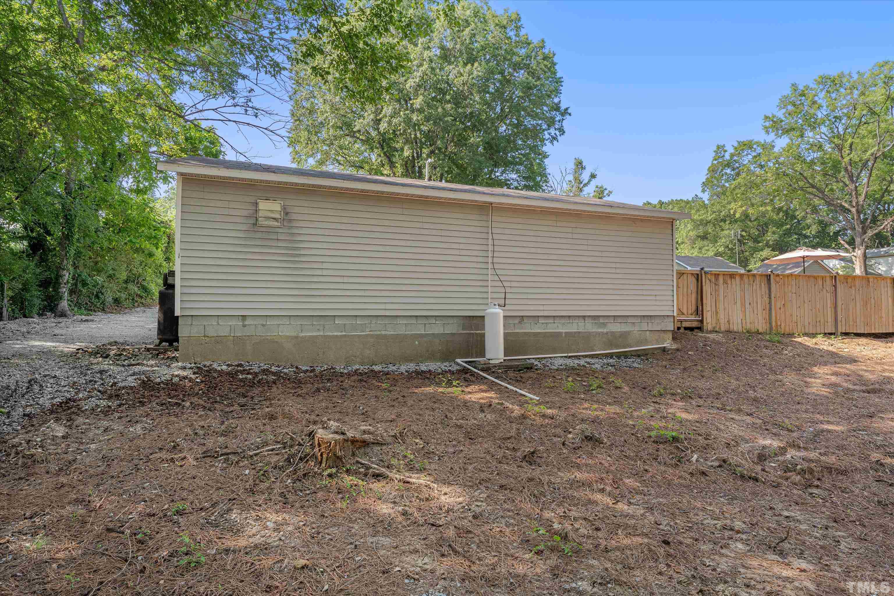308 South Mineral Springs Road Durham, NC 27703 - Photo 40 of 42 a view of a backyard