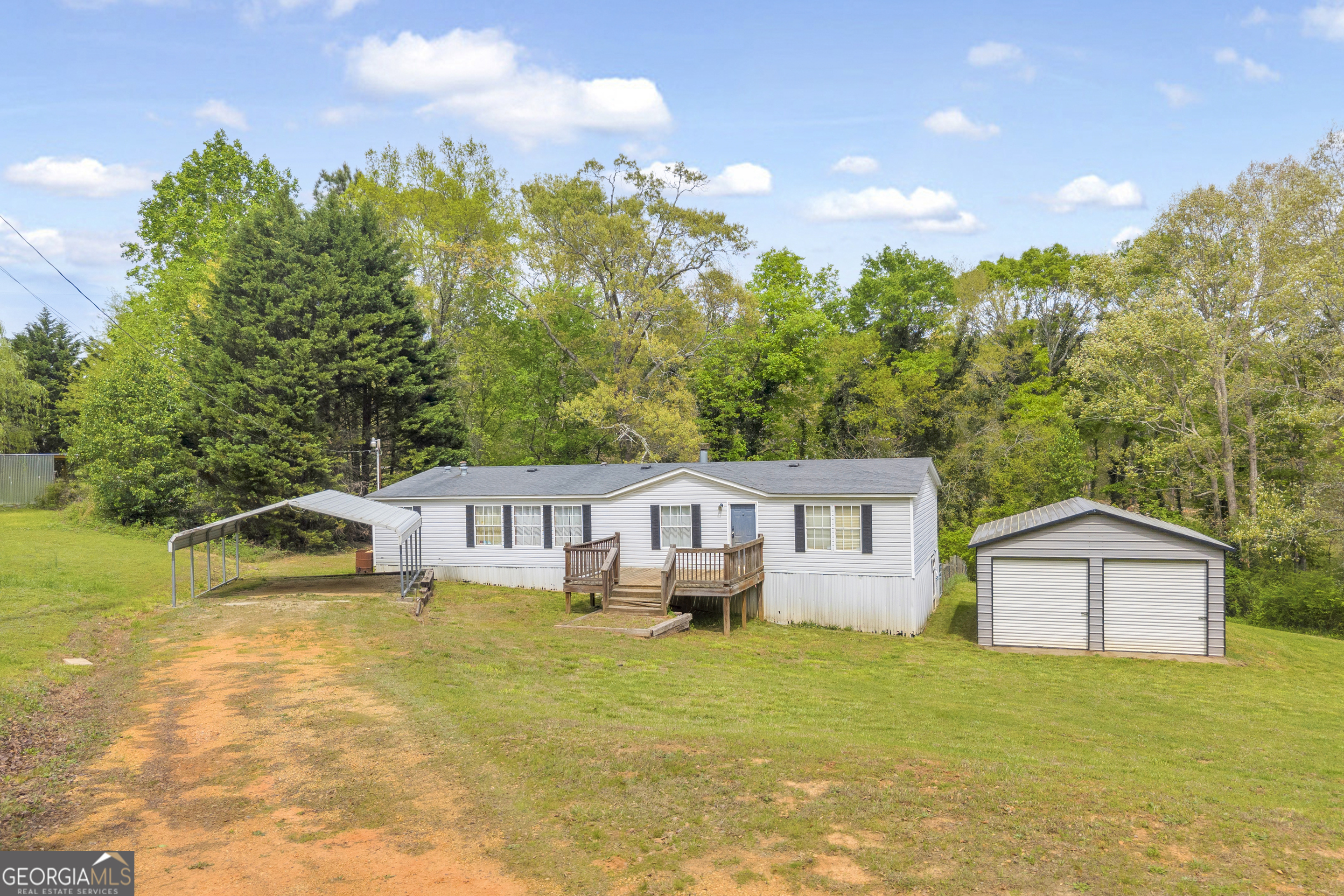 35 Jordan Loop Toccoa, GA 30577 - Photo 11 of 49 a view of a house with a garden