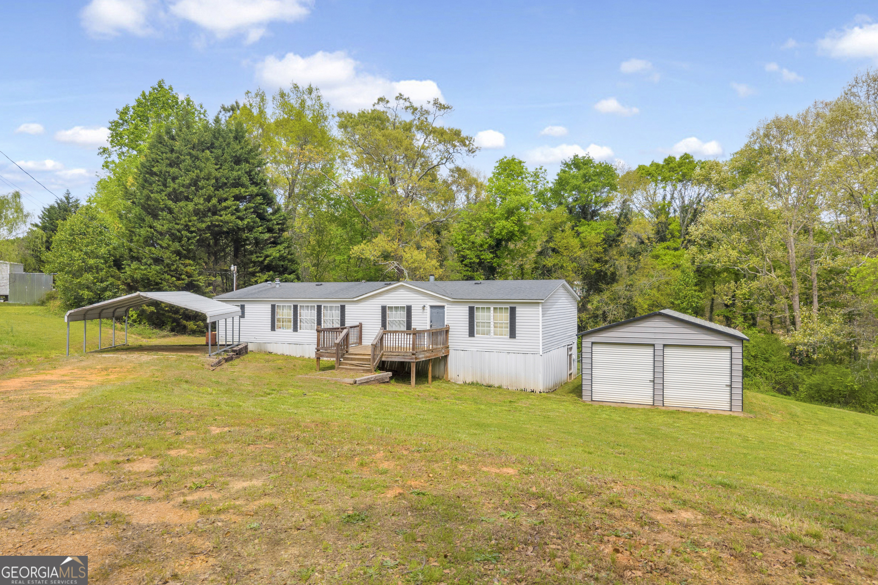 35 Jordan Loop Toccoa, GA 30577 - Photo 13 of 49 a house view with a garden space