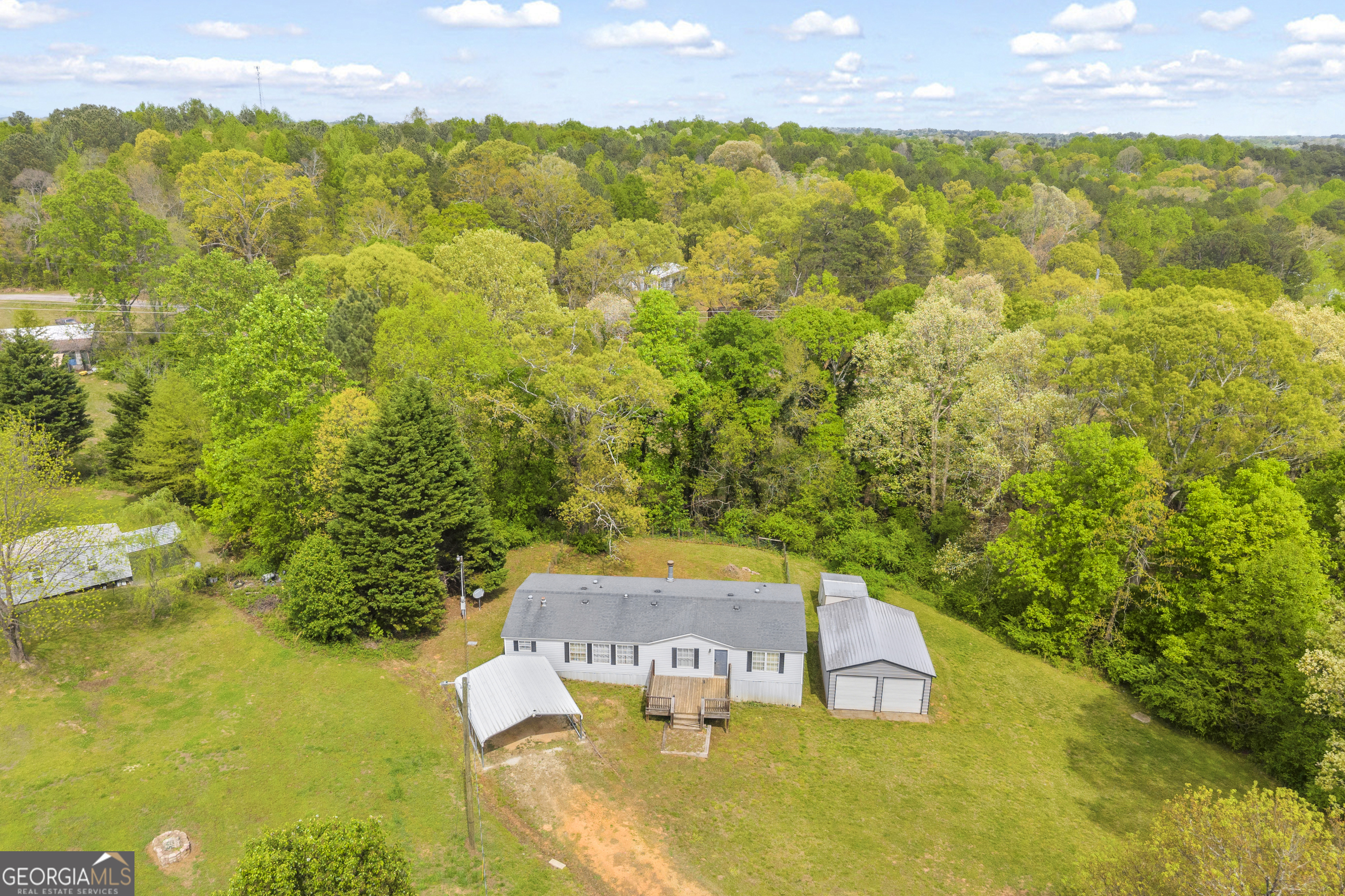 35 Jordan Loop Toccoa, GA 30577 - Photo 19 of 49 a view of a swimming pool with a yard