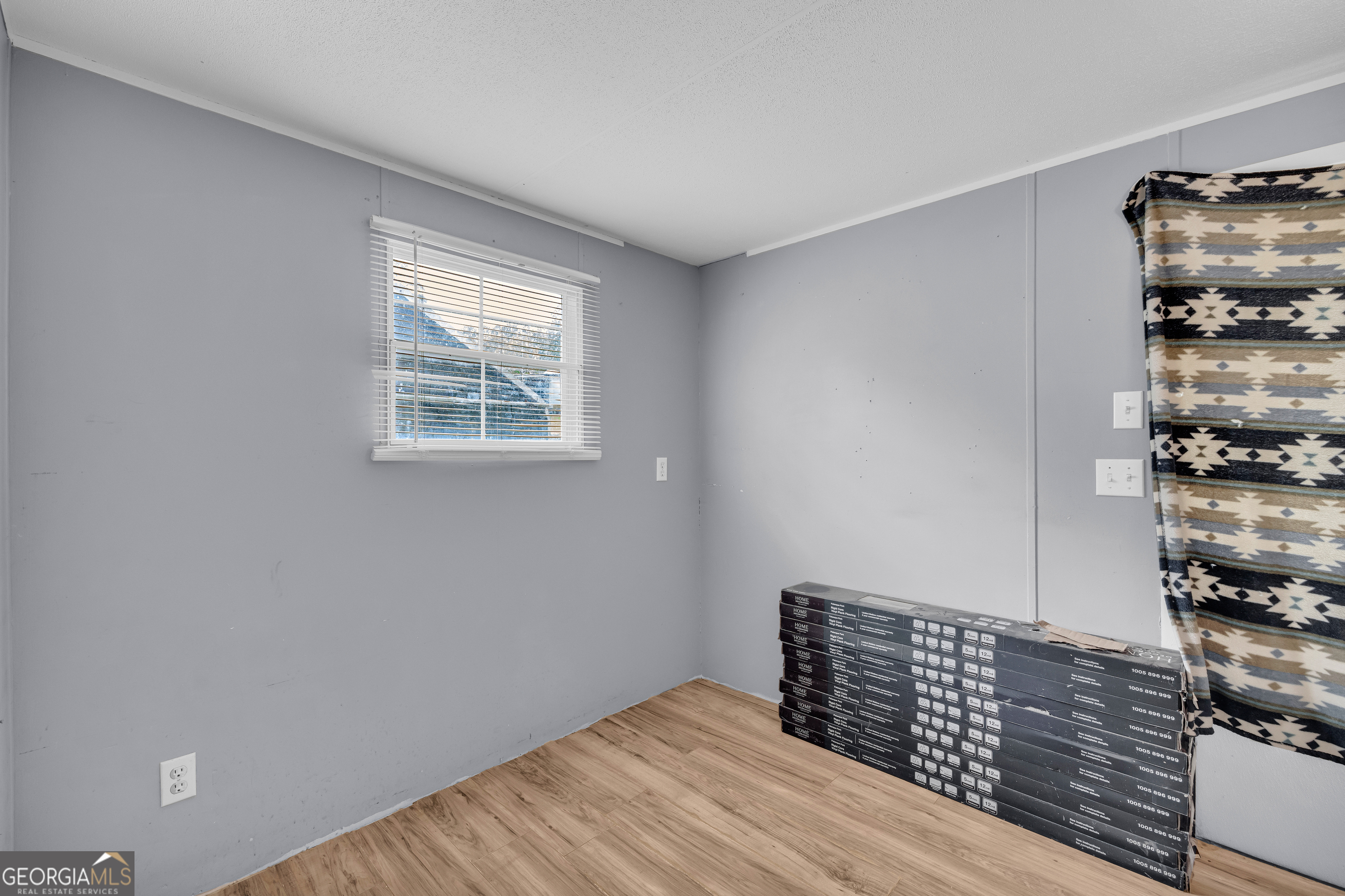 35 Jordan Loop Toccoa, GA 30577 - Photo 42 of 49 a view of wooden floor and windows in a room