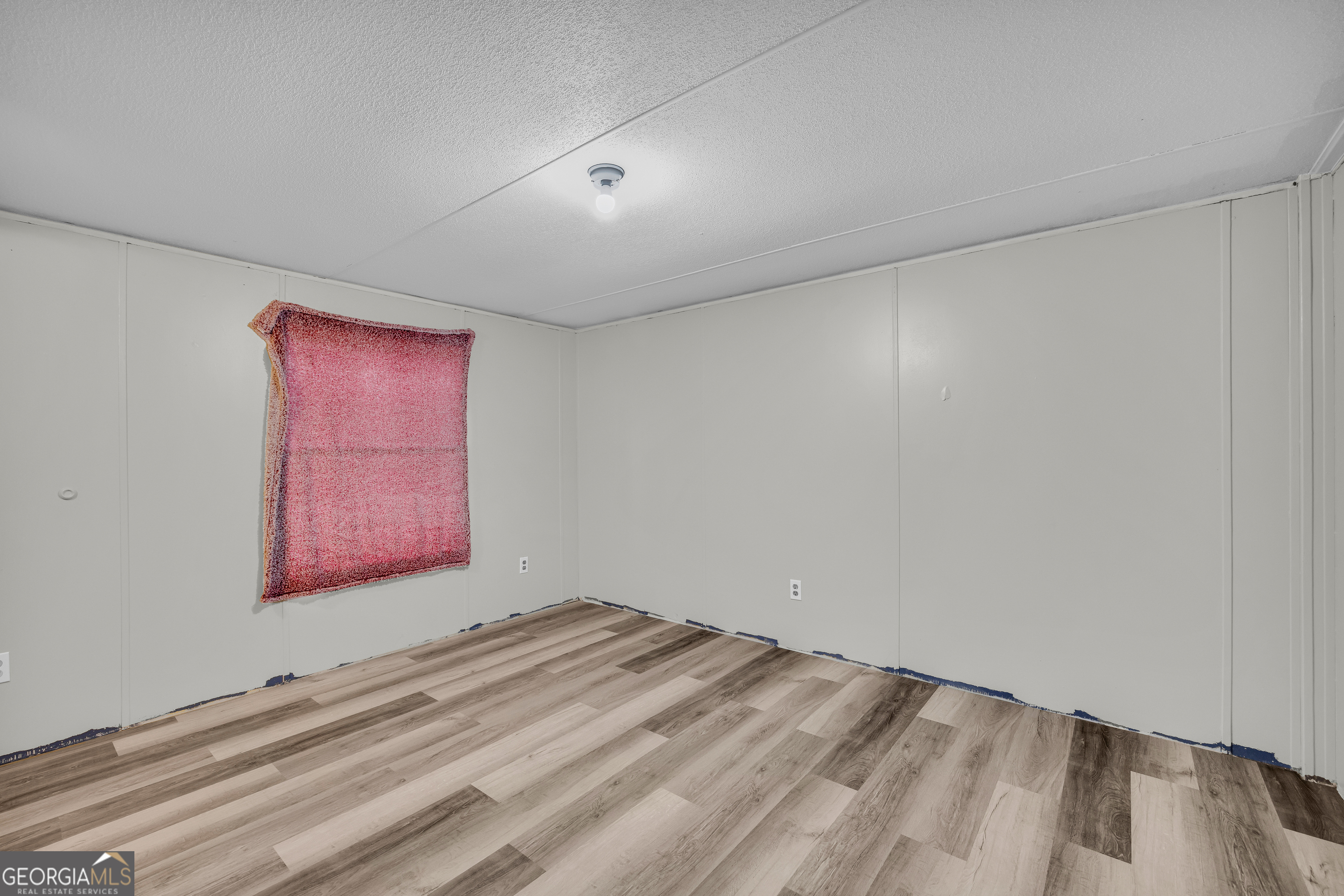 35 Jordan Loop Toccoa, GA 30577 - Photo 44 of 49 a view of a room with wooden floor and windows