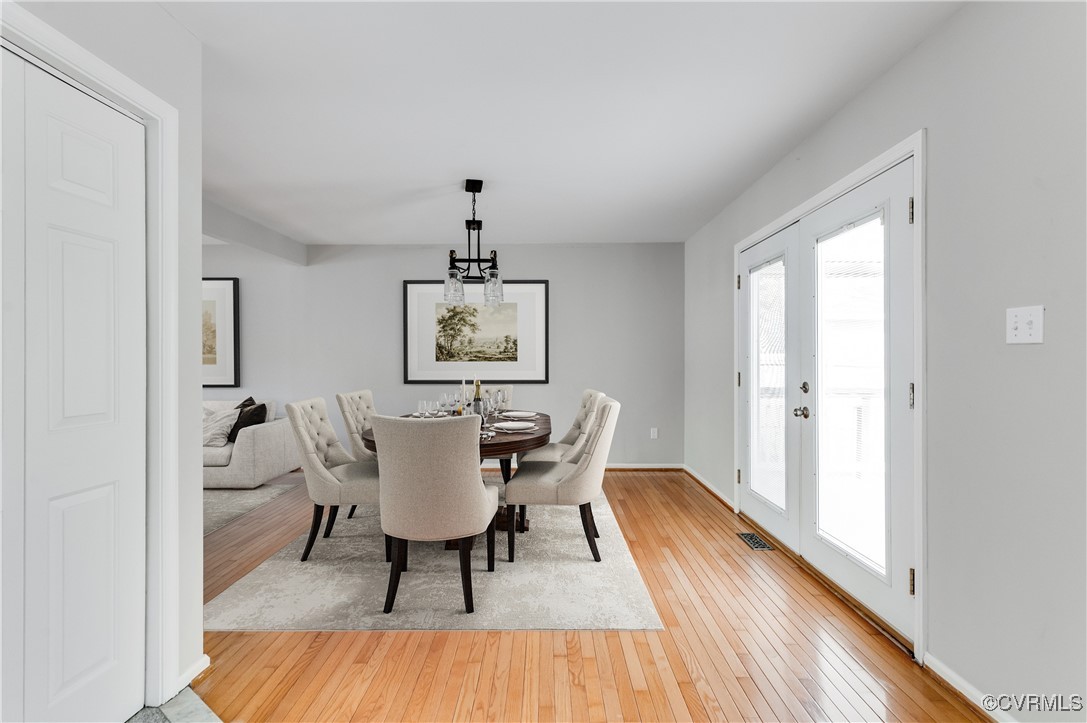 12262 Church Road Henrico, VA 23233 - Photo 17 of 50 Dining space with baseboards, a chandelier, visibl