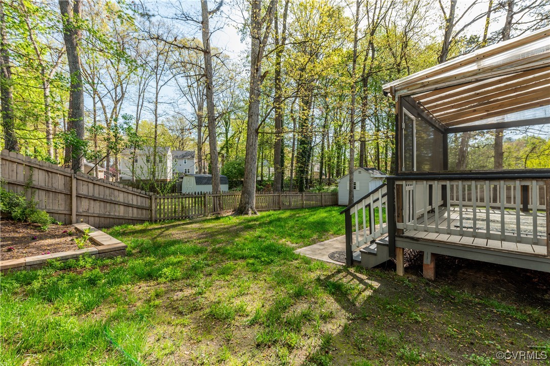 12262 Church Road Henrico, VA 23233 - Photo 42 of 50 View of yard featuring a fenced backyard, an outbu