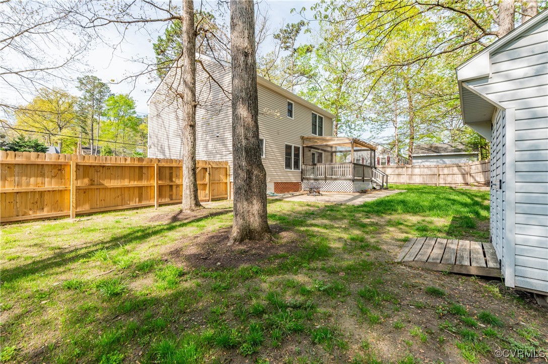 12262 Church Road Henrico, VA 23233 - Photo 44 of 50 View of yard with a fenced backyard and a deck