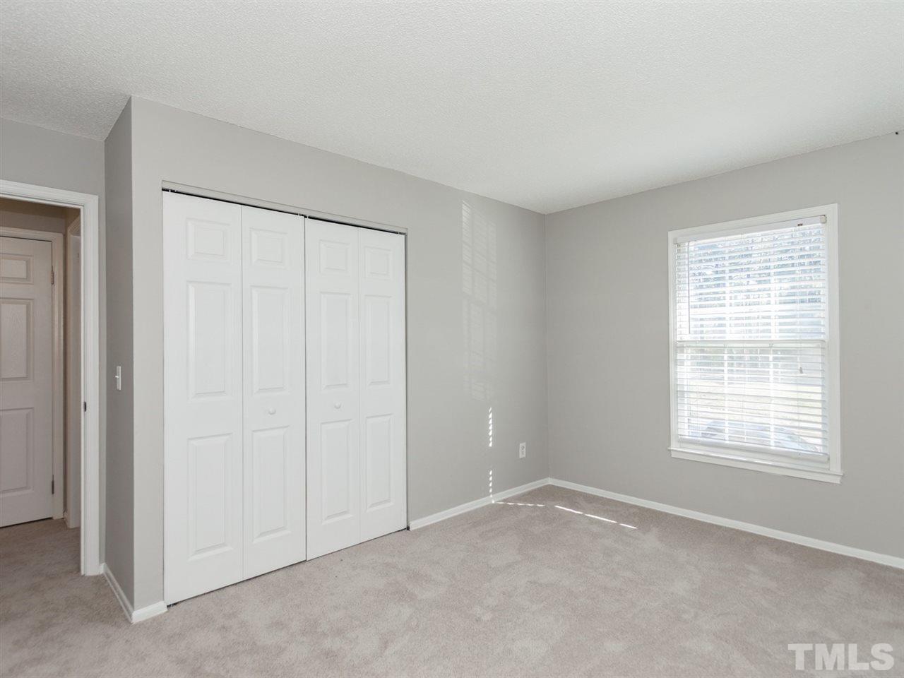 3000 Morningside Drive Raleigh, NC 27607 - Photo 15 of 25 an empty room with windows and closet