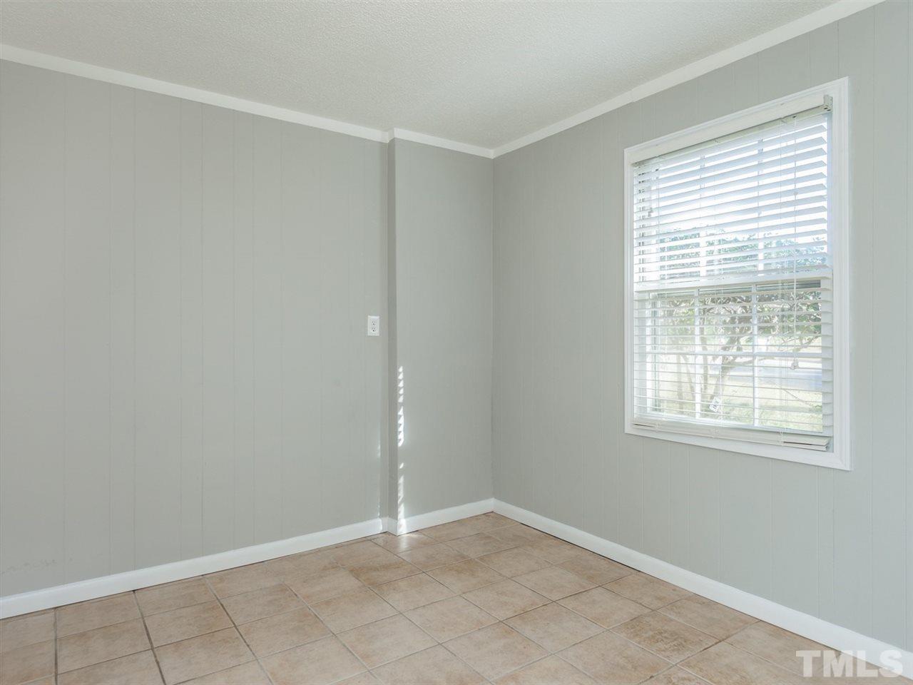 3000 Morningside Drive Raleigh, NC 27607 - Photo 17 of 25 a view of an empty room with a window