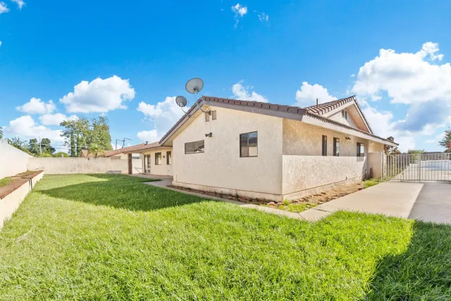 a view of a porch and garden