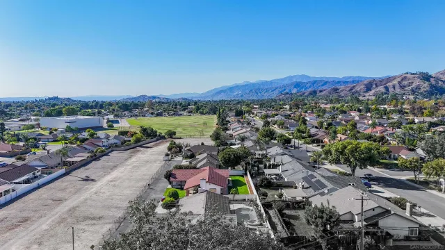 a view of a city and mountains
