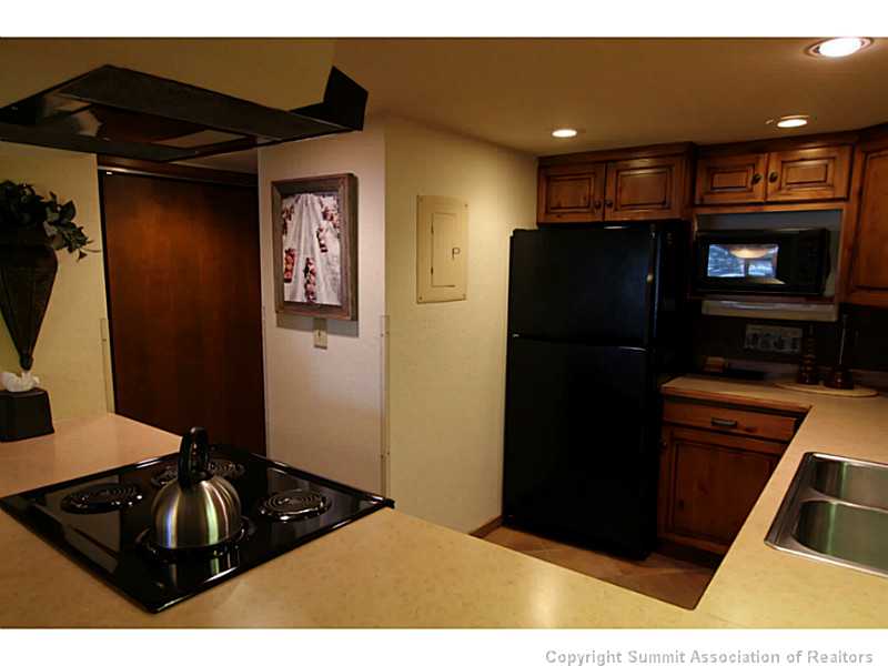 800 Copper Road, Unit 179 Frisco, CO 80443 - Photo 7 of 23 Kitchen. Open counter-top makes meals from kitchen to dining room easy