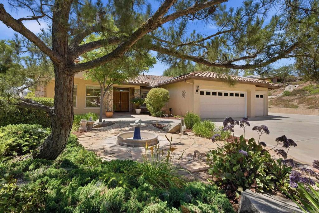 2527 Southern Oak Road Ramona, CA 92065 - Photo 7 of 56 a front view of a house with a yard