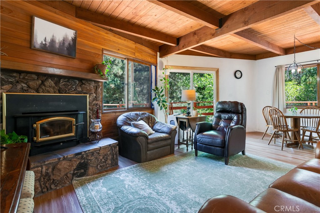 39444 Canyon Drive Forest Falls, CA 92339 - Photo 10 of 28 a living room with furniture and a fireplace