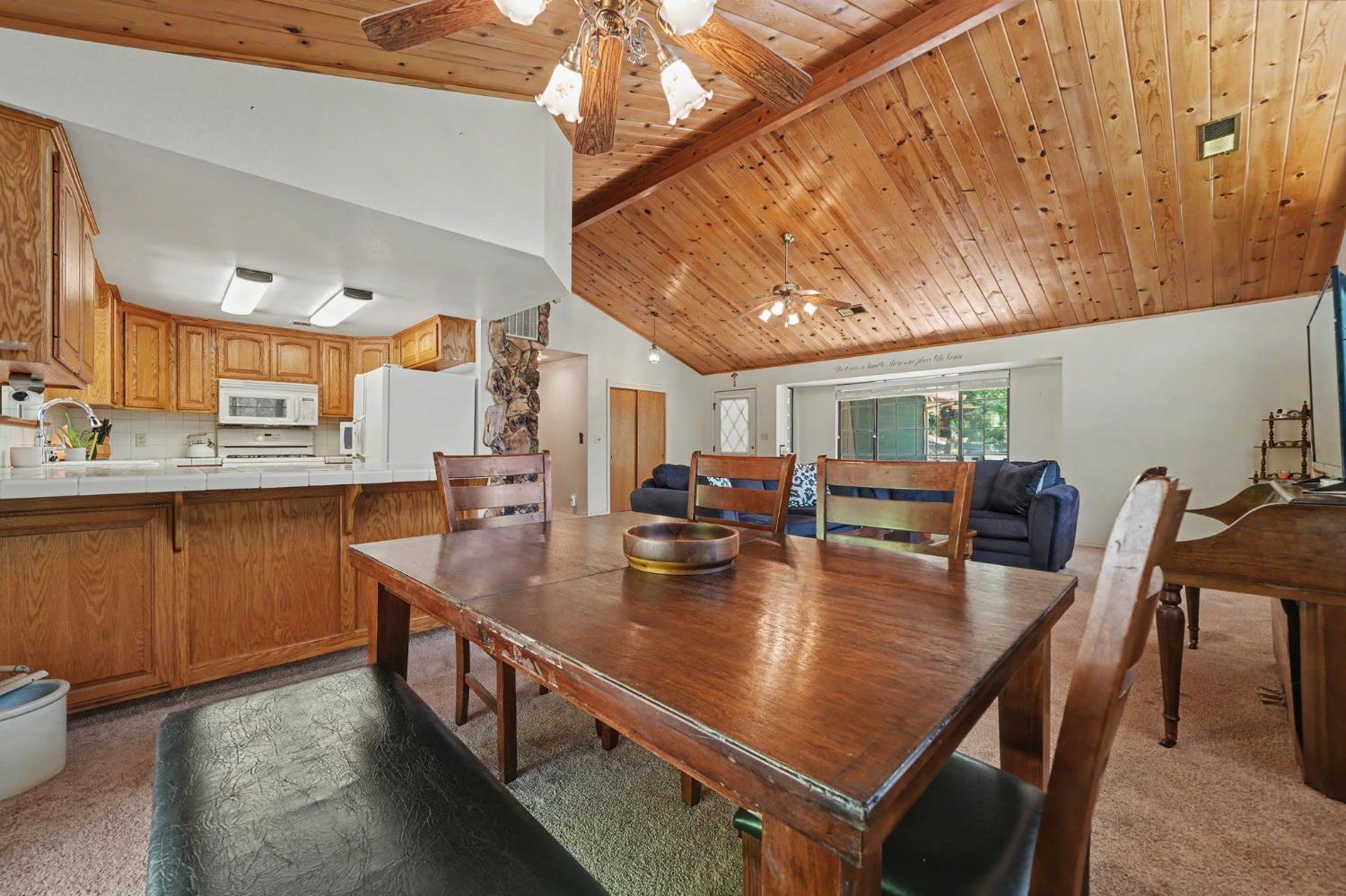 20310 State Rte 26 West Point, CA 95255 - Photo 14 of 57 a dining room with furniture and wooden floor