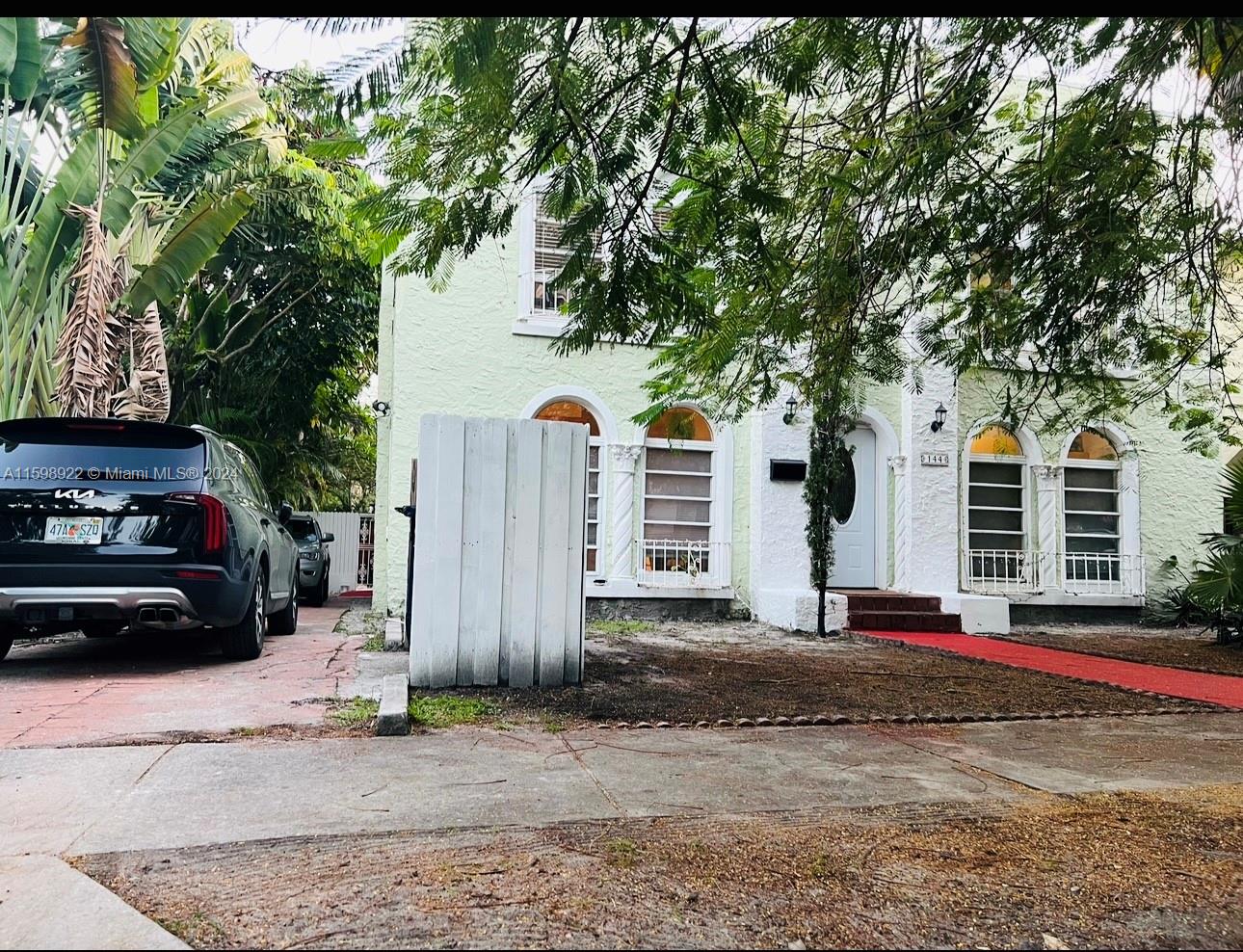 144 Northeast 43rd Street, Unit 2 Miami, FL 33137 - Photo 10 of 10 a car parked in front of a house