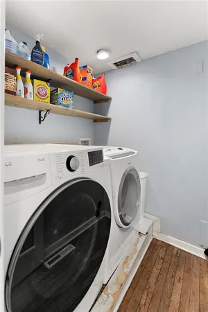 a utility room with dryer and washer
