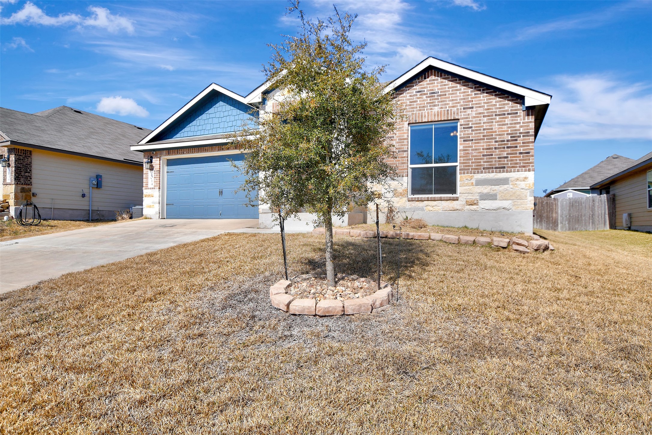 1014 Fannin Street Brenham, TX 77833 - Photo 4 of 43 a front view of a house with a yard