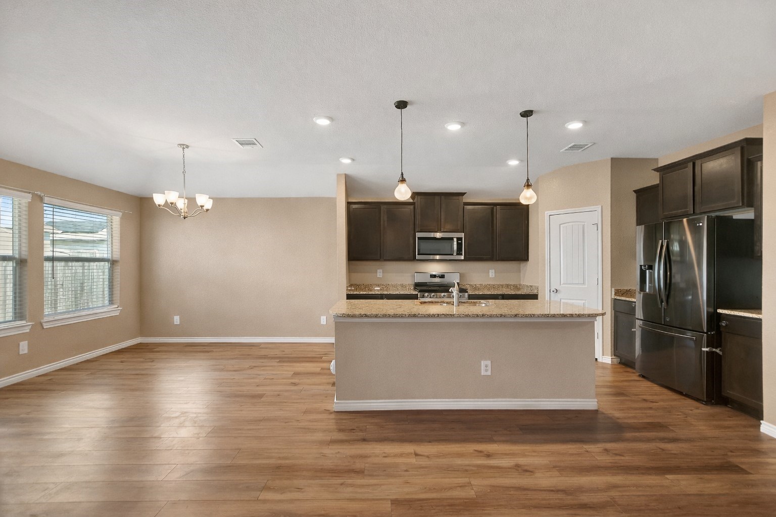 1014 Fannin Street Brenham, TX 77833 - Photo 10 of 43 This functional layout is ideal for entertaining, everyday comfort, and flexible furniture arrangements, making it a standout feature for buyers searching for 5-bedroom homes in Washington County. Image has been digitally repainted.