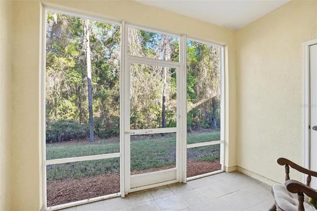 a view of a room that has a large window