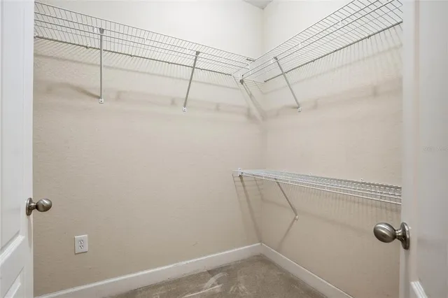 a view of a room with racks on the wall