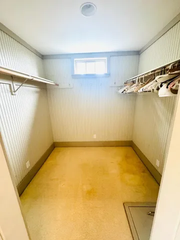 a view of a room with racks on the wall