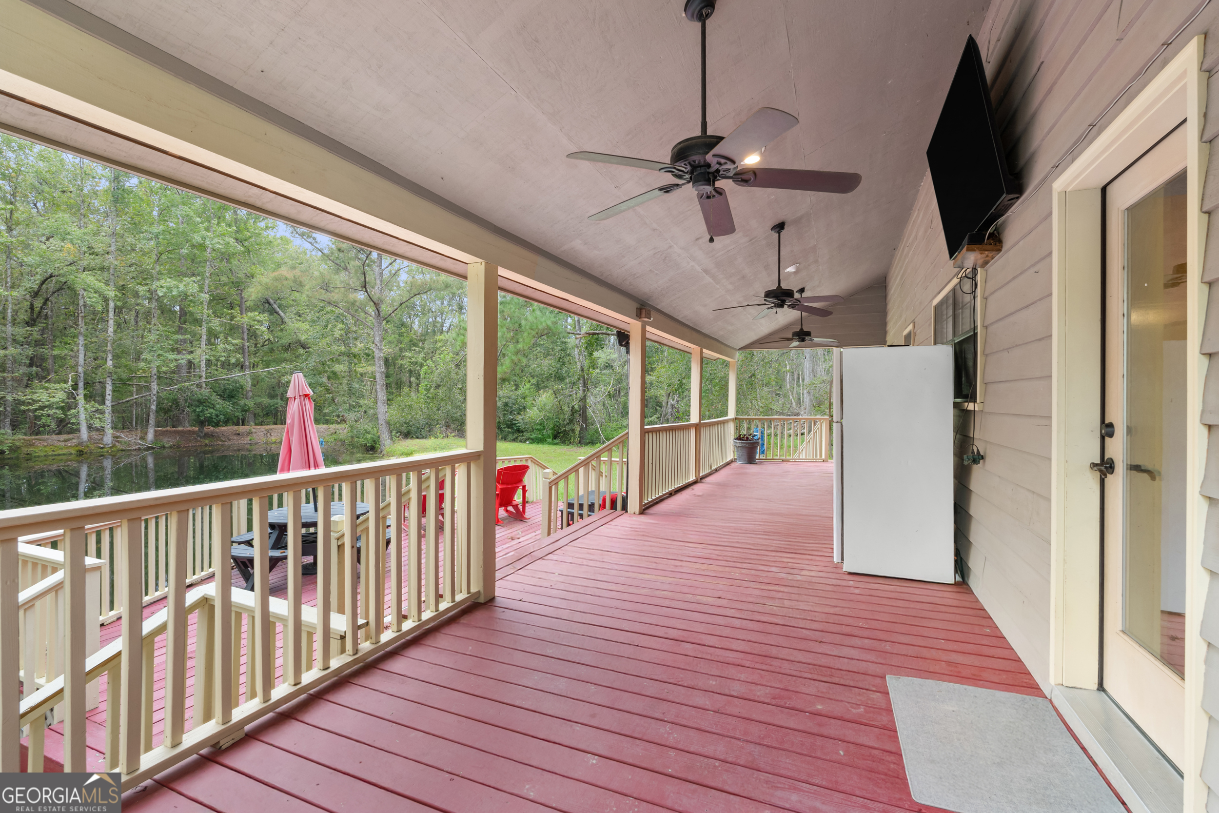 3770 Hill Road Metter, GA 30439 - Photo 23 of 32 a view of a balcony with wooden floor