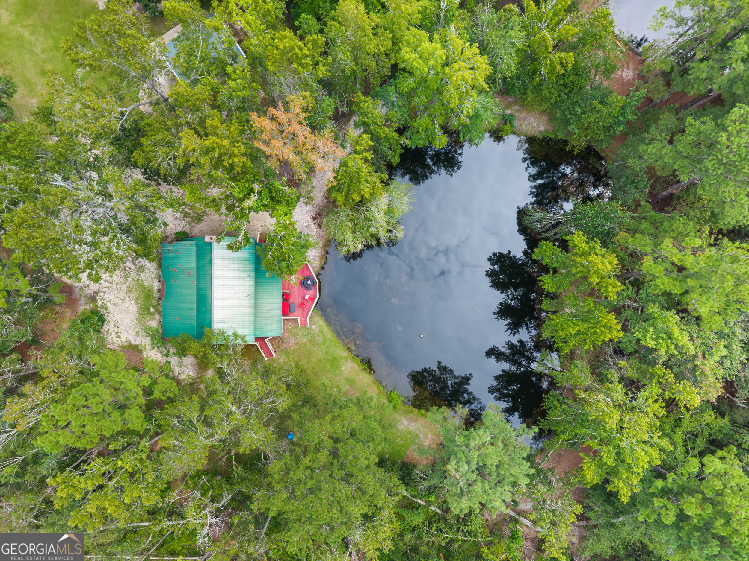3770 Hill Road Metter, GA 30439 - Photo 28 of 32 an aerial view of a house with a yard