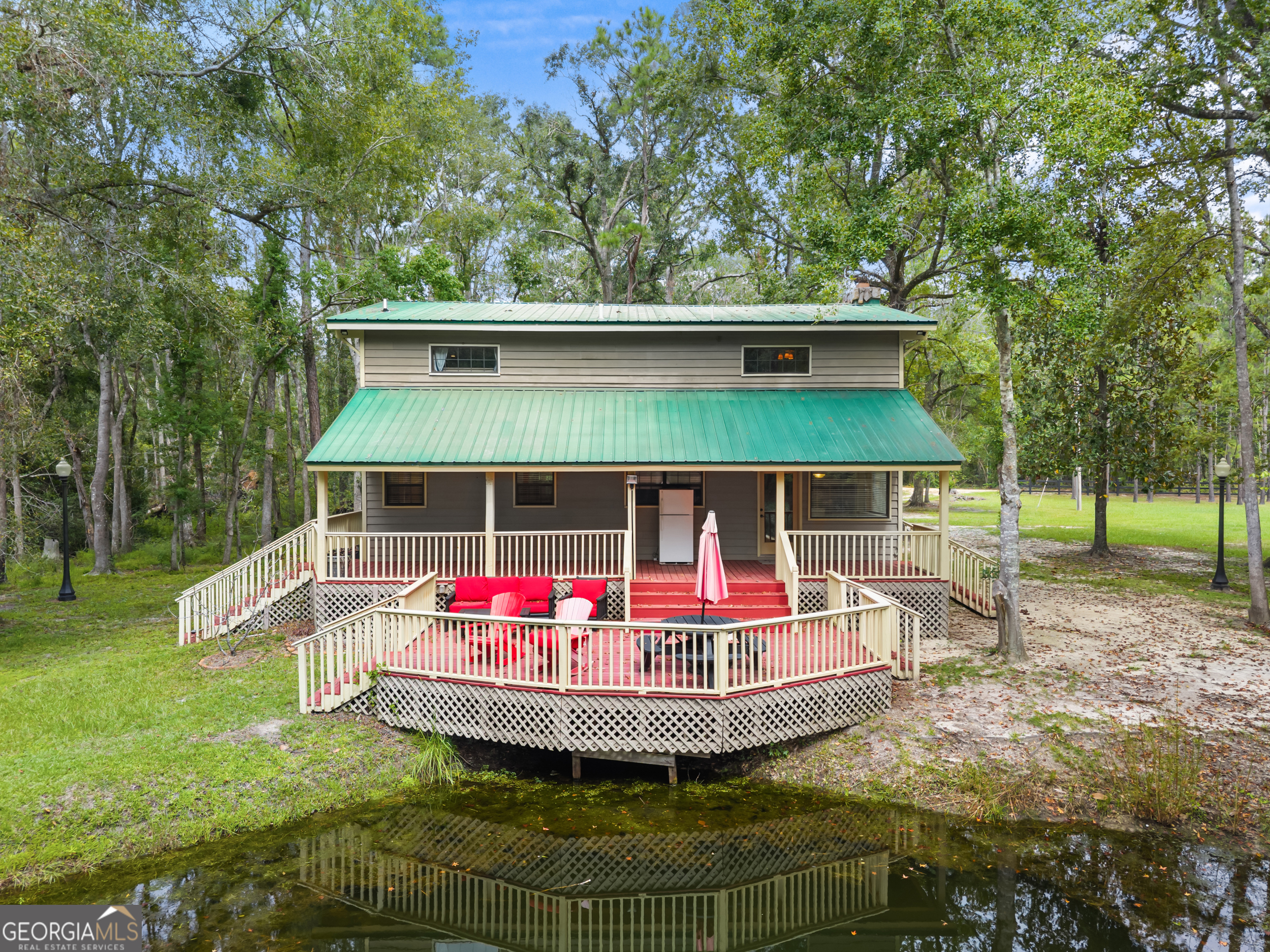 3770 Hill Road Metter, GA 30439 - Photo 29 of 32 a small garden with wooden fence