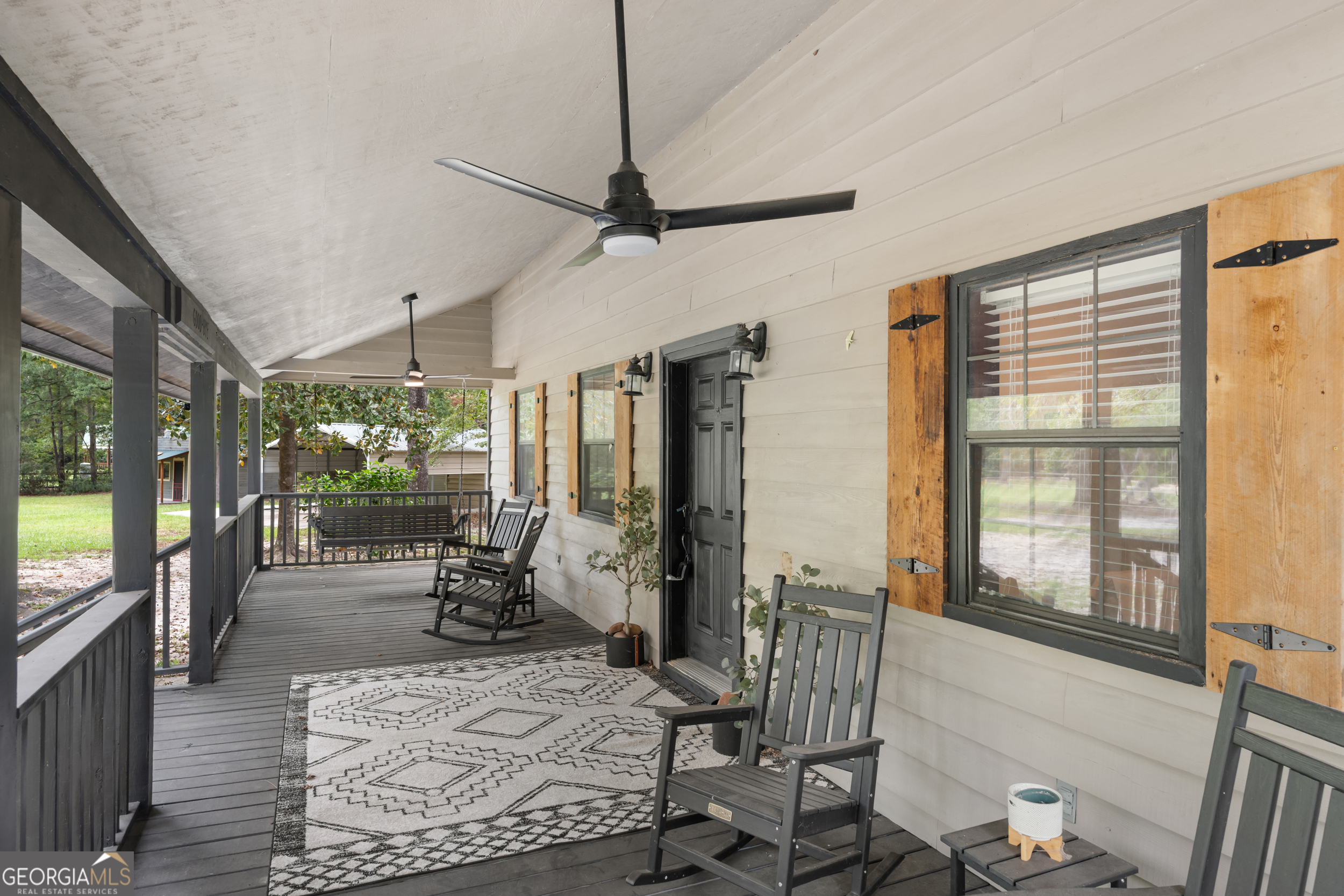 3770 Hill Road Metter, GA 30439 - Photo 4 of 32 a living room with furniture and a large window