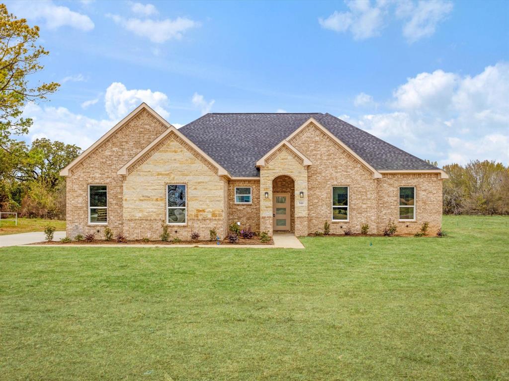 544 Shepherd Road Combine, TX 75159 - Photo 3 of 36 View of front of home featuring a shingled roof, brick siding, and a front yard